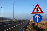 signs in foggy motorway