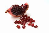 quarter of dark ruby pomegranat and grains 