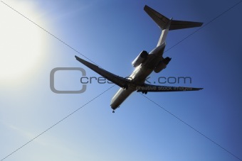  airliner landing at dusk