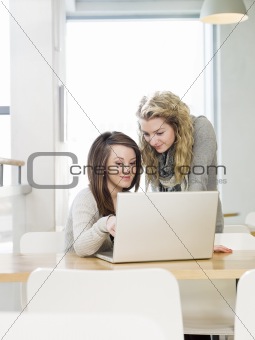 Two girls with a computer