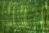 green grunge painted and scratched abstract background