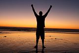 Man Raising Hands in Sunset - (Victory)