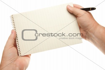 Male Hands Holding Pen and Pad of Paper Isolated on a White Background.
