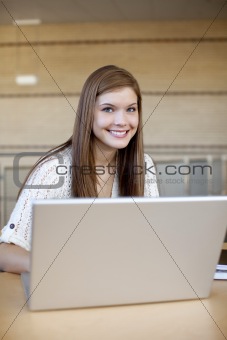 Girl studying with laptop