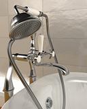 classic roll top bath and taps with shower attatchment in contem
