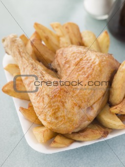 Portion Of Chicken And Chips On A Polystyrene Tray