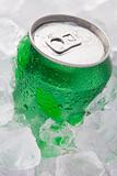 Green Can Of Fizzy Soft Drink Set In Ice 