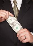 Businessman with Coat and Tie Holding Dollar Bill.