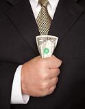 Businessman with Coat and Tie Squeezing Dollar Bill.
