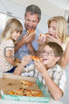 Family Eating Pizza Together 