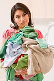 Woman Holding Pile Of Laundry