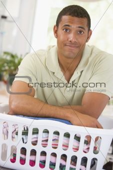 Man Leaning On Laundry 