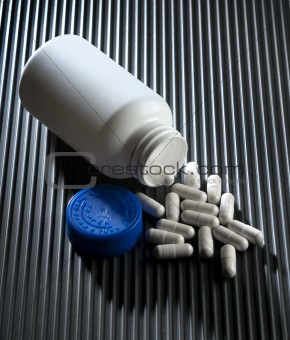 Bottle and capsules