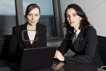 Two businesswomen in office