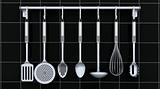 kitchen utensils on a rack