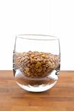 lentils in glass on wooden table