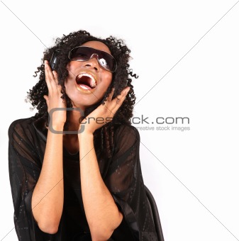 Woman Singing While Listening to Music on Headphones