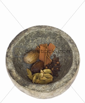 spices in a stone bowl isolated