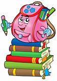 Pink school bag on books