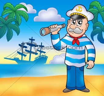 Sailor with spyglass on beach