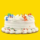 Delicious White Vanilla Birthday Cake Isolated On Yellow Backgro