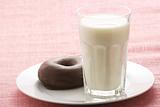 breakfast glass of chocolate milk and donut 