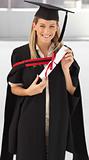 Woman smiling at her graduation 