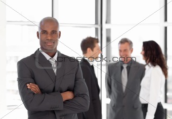Young Businessman standing out from the Crowd