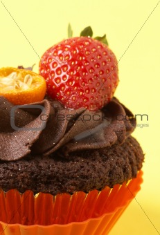 Miniature chocolate cupcake with strawberry