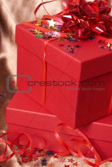 Red gift boxes with bows and stars