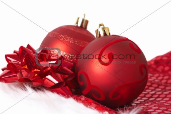 Red Christmas baubles on Santa hat