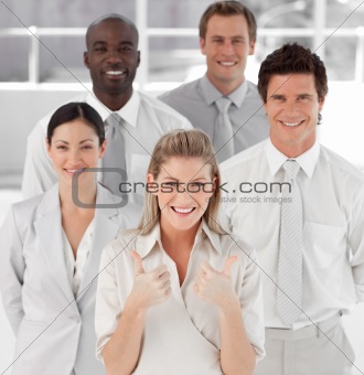 Female Business Leader with Thumbs up to camera