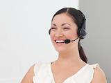 Beautiful International Business woman on a Headset smiling