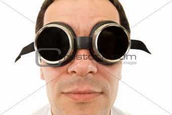 Man with large dark protective goggles