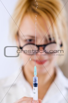 Nurse preparing the injection