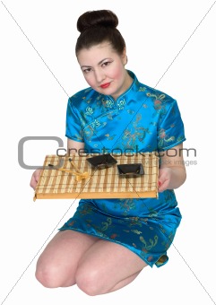 Japanese girl with ceremony tea-tray