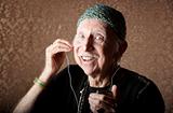 Elderly Hiptser Listening to Handheld Audio Device