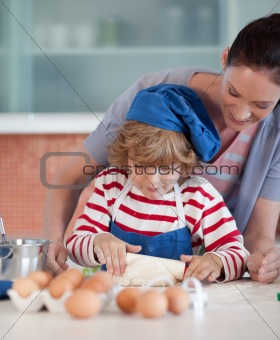 Mother and child doing Christmas baking