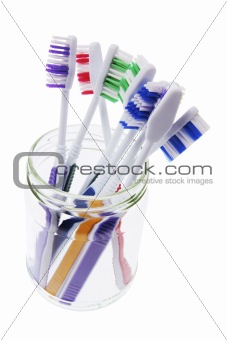 Toothbrushes in Glass Jar