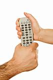 Hands holding a remote control