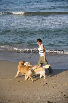 Girl walking with her dogs