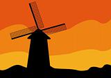 Windmill on sunset