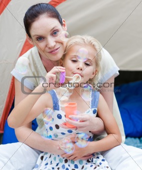 Young Child Blowing Bubbles