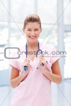 Smiling happy female nurse