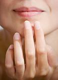female lips and fingers