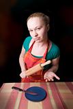 wife with rolling pin