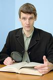 Man read book on a workplace