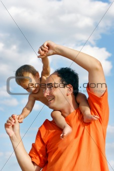 happy father and son outdoors
