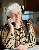 Portrait of a senior woman talking on the phone 
