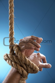 hand tight by rope